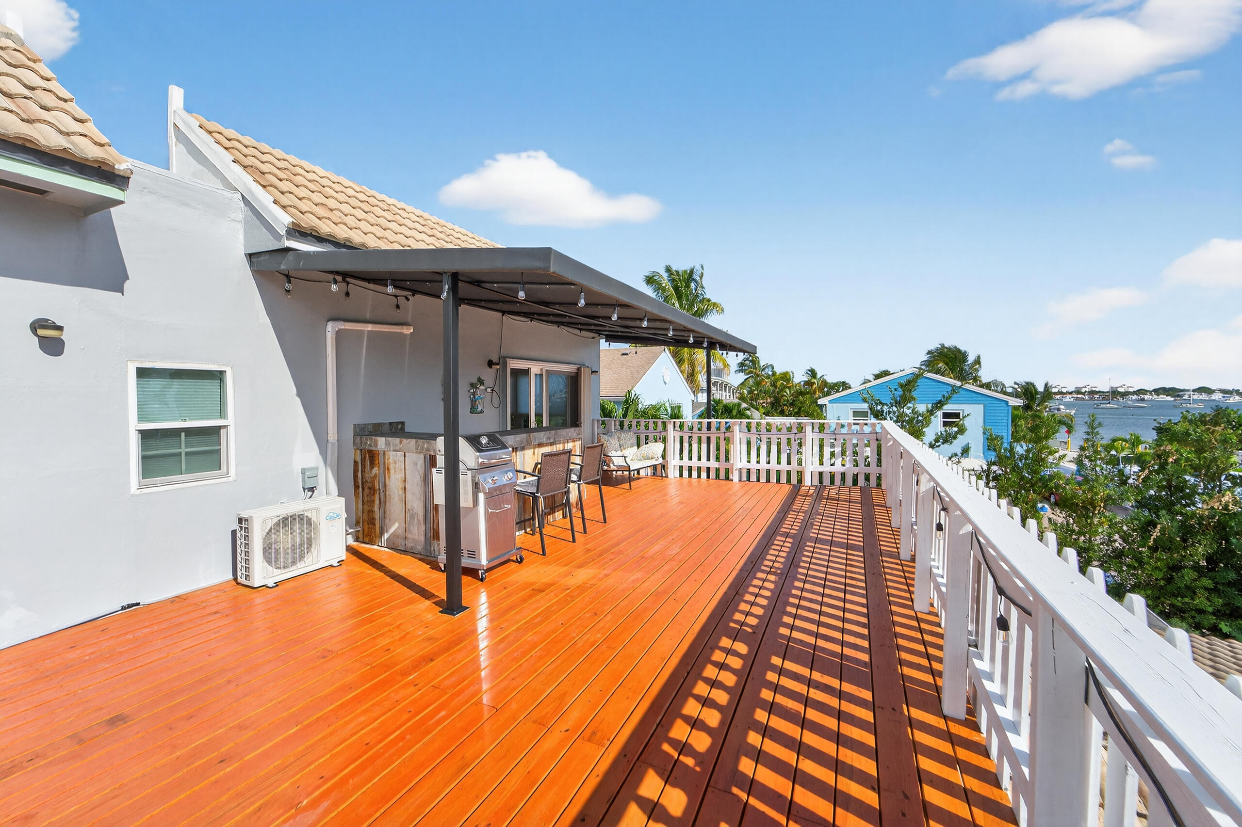300 East 24th Street Riviera Beach, FL 33404 - Photo 14 of 19 a balcony with view of swimming pool