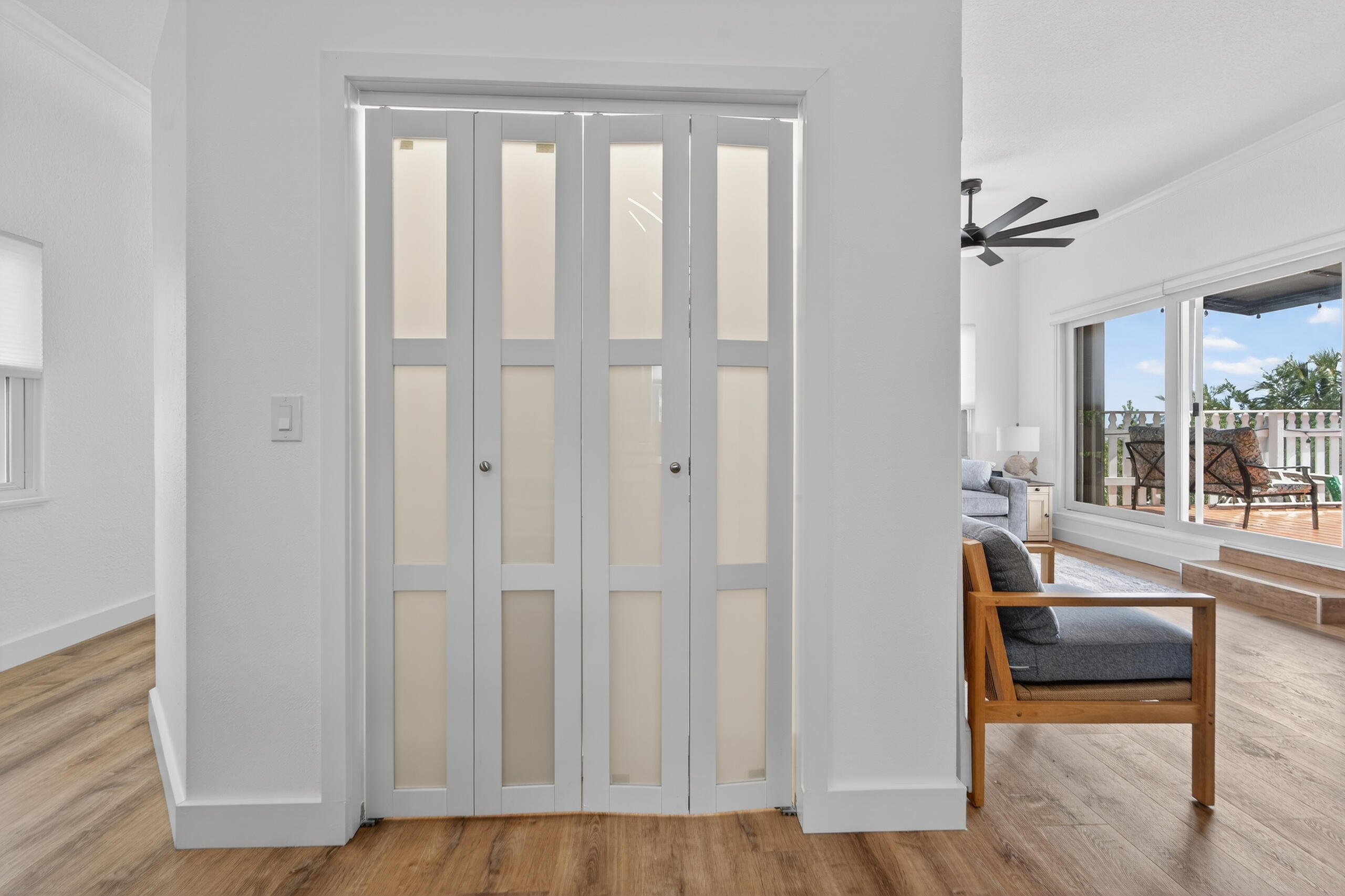 300 East 24th Street Riviera Beach, FL 33404 - Photo 6 of 19 wooden floor in an empty room with a window