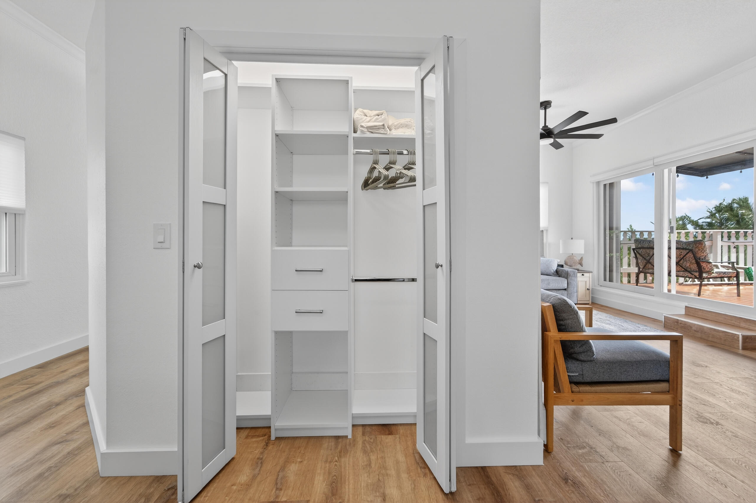 300 East 24th Street Riviera Beach, FL 33404 - Photo 7 of 19 wooden floor and windows in a room