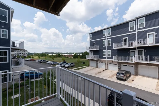 a view of a balcony with city view