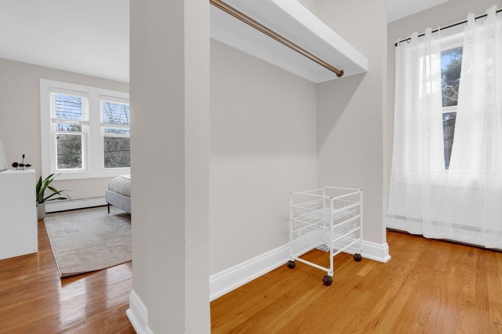 35 Boulevard Road, Unit 35 Arlington, MA 02474 - Photo 11 of 20 a view of livingroom with furniture and wooden floor