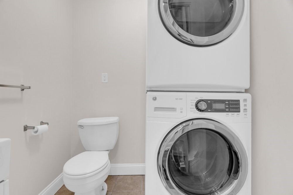 35 Boulevard Road, Unit 35 Arlington, MA 02474 - Photo 13 of 20 a close view of a utility room with dryer and washer