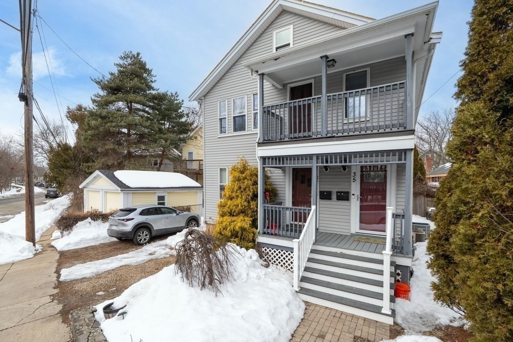 35 Boulevard Road, Unit 35 Arlington, MA 02474 - Photo 20 of 20 a view of a building with car parked