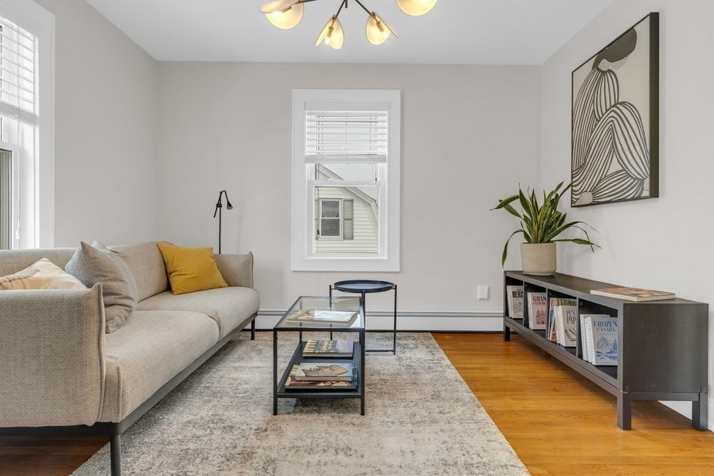 35 Boulevard Road, Unit 35 Arlington, MA 02474 - Photo 5 of 20 a living room with furniture and a window