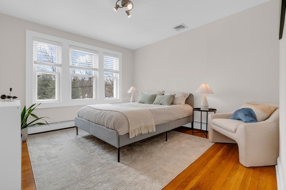 35 Boulevard Road, Unit 35 Arlington, MA 02474 - Photo 10 of 20 a bedroom with a bed and window