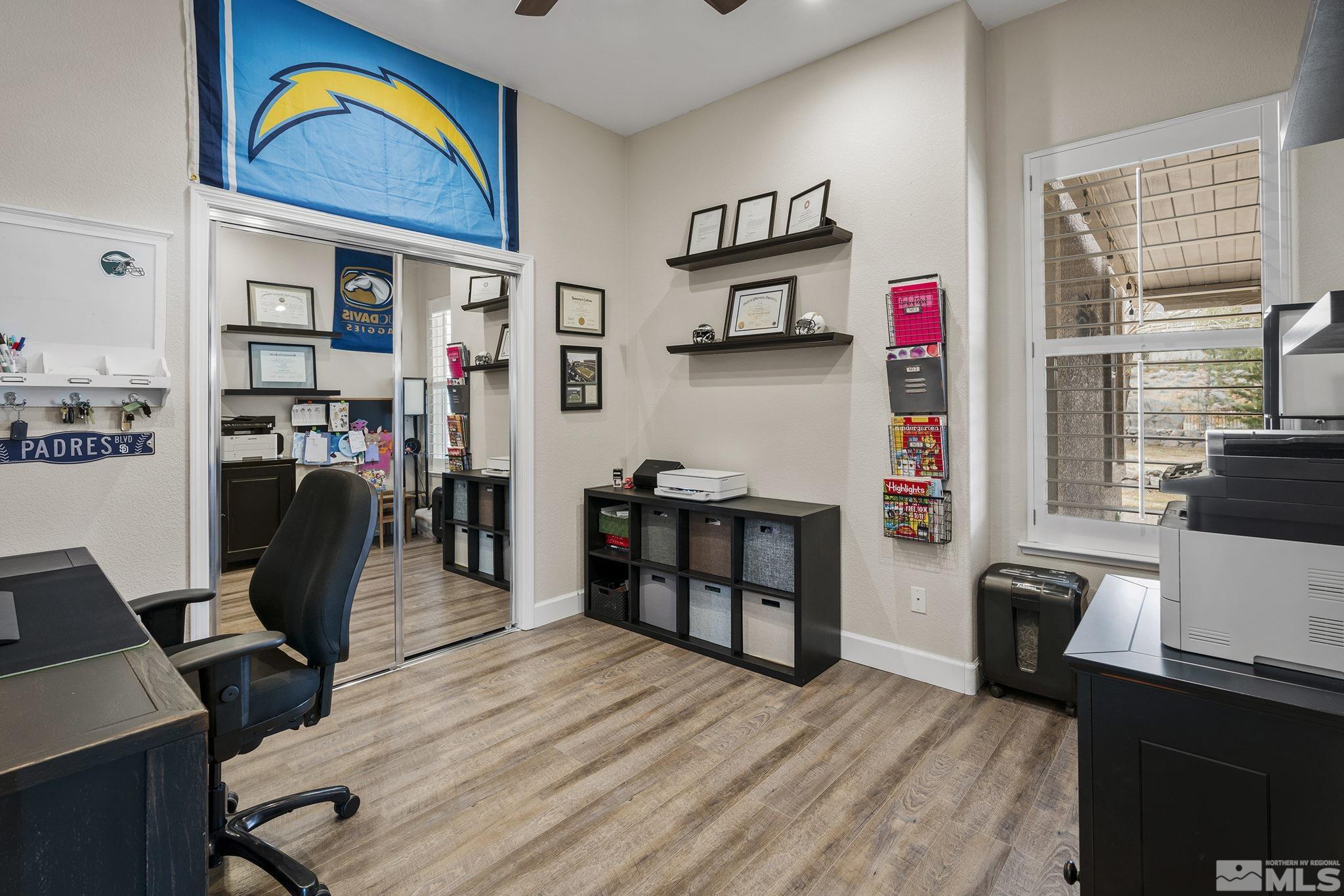 5630 North White Sands Road Reno, NV 89511 - Photo 22 of 40 a view of a workspace with furniture and a workspace