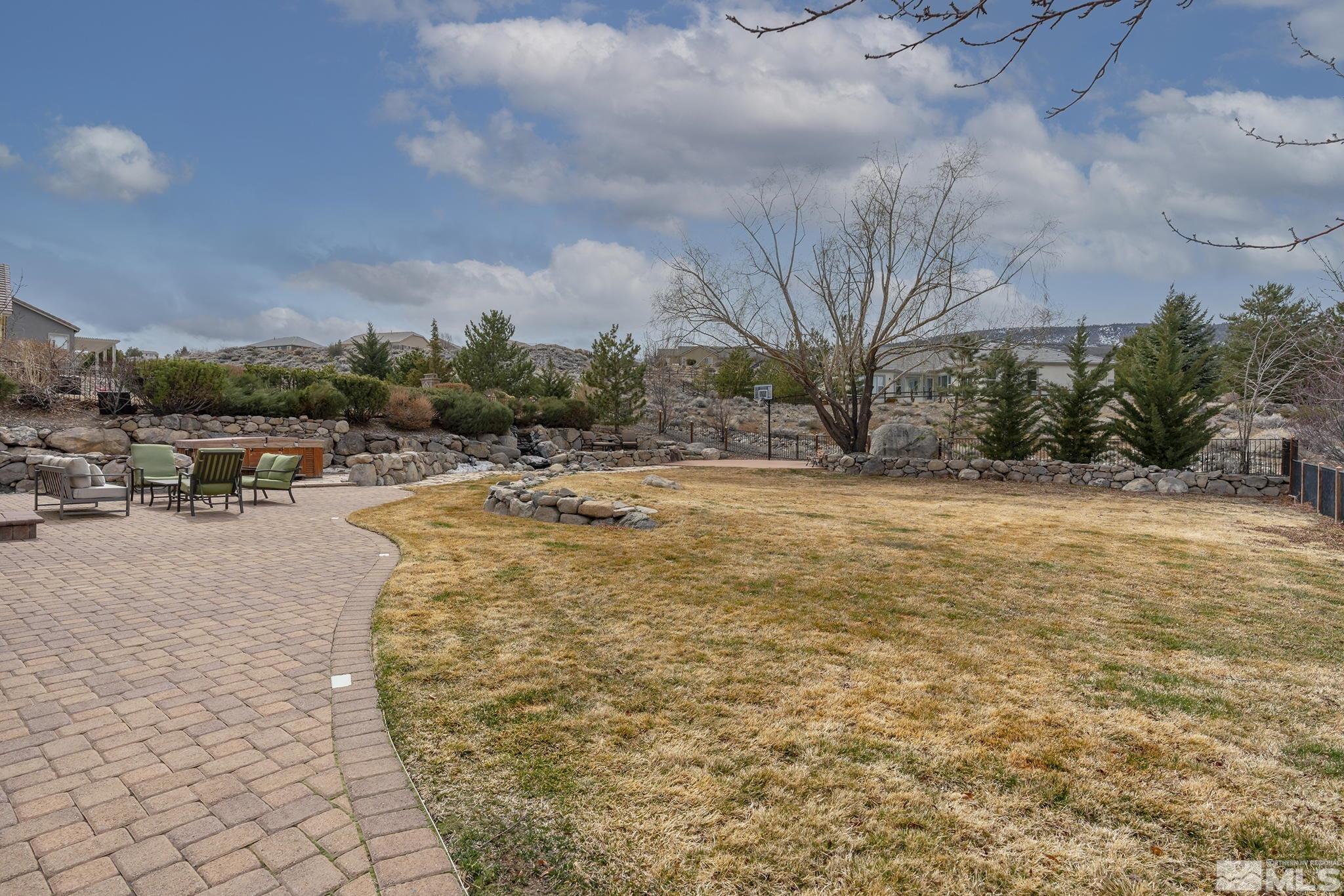 5630 North White Sands Road Reno, NV 89511 - Photo 28 of 40 a view of swimming pool and lake view
