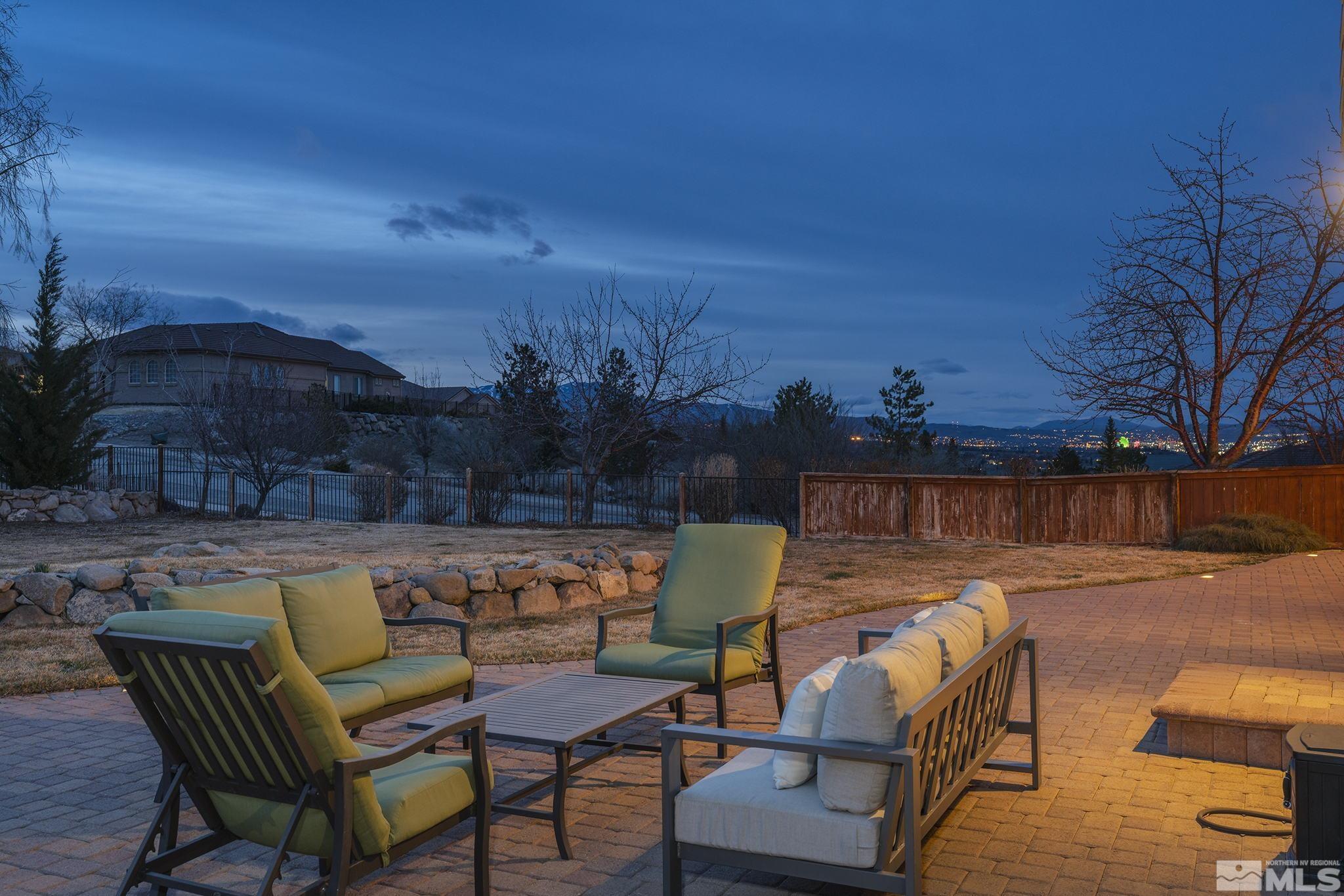 5630 North White Sands Road Reno, NV 89511 - Photo 29 of 40 a view of a chairs and table in the patio