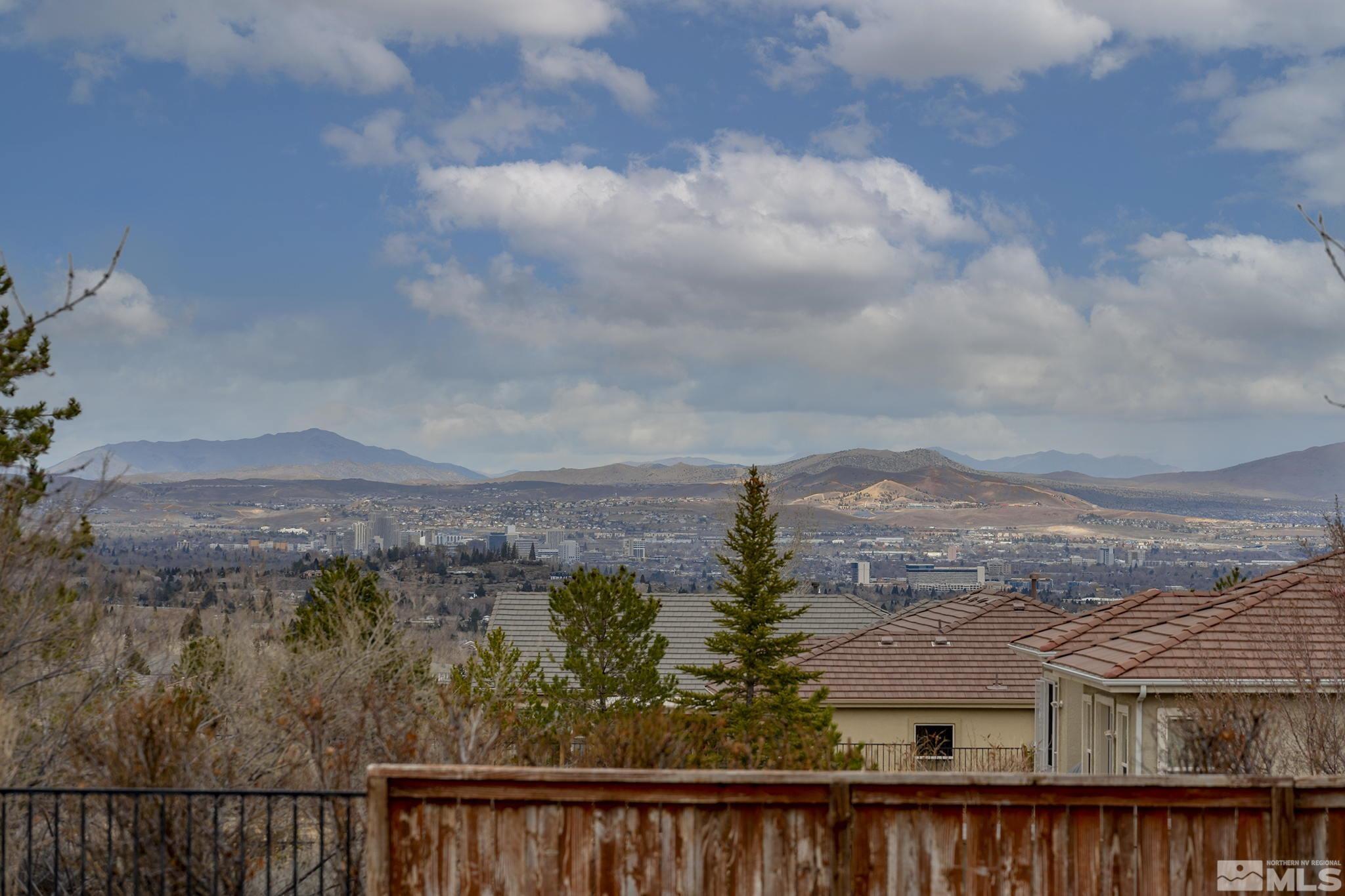 5630 North White Sands Road Reno, NV 89511 - Photo 36 of 40 a view of a city from a balcony