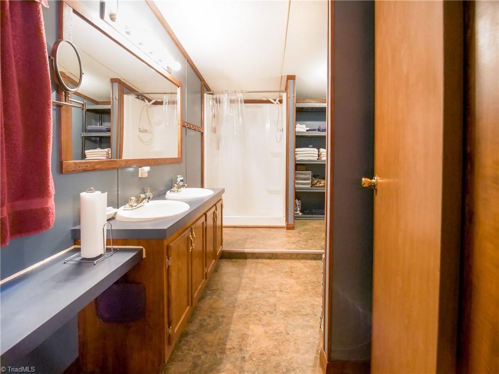 1267 Jubilee Road Linwood, NC 27299 - Photo 19 of 24 Primary bathroom features dual vanity
