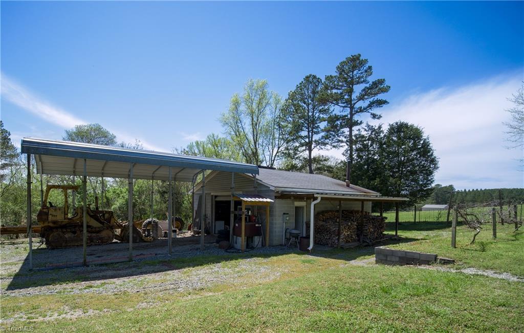 1267 Jubilee Road Linwood, NC 27299 - Photo 23 of 24 Heated and cooled shop with solar panels and additional carport