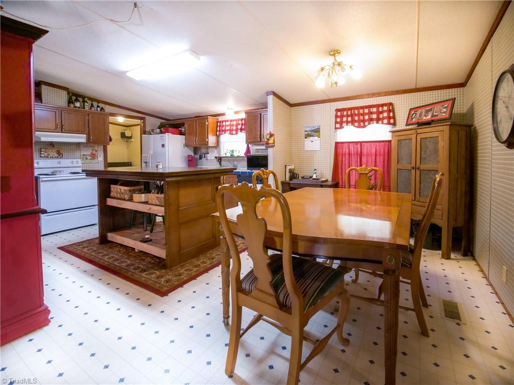 1267 Jubilee Road Linwood, NC 27299 - Photo 8 of 24 Kitchen with dining area