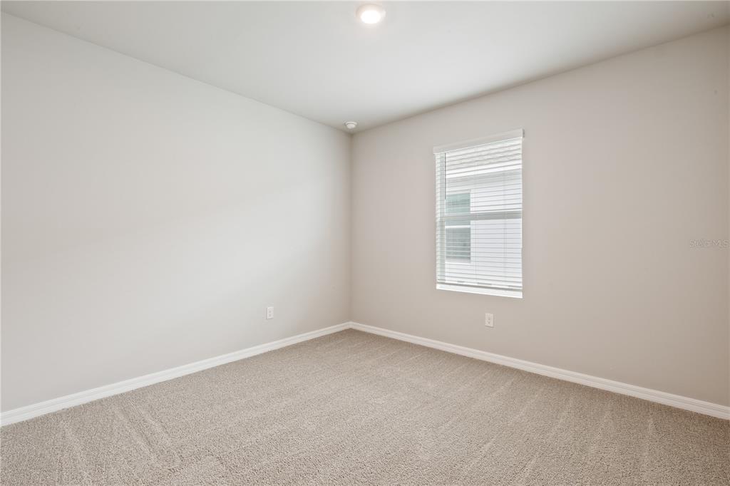 9498 Turtle Grass Circle Punta Gorda, FL 33950 - Photo 10 of 21 an empty room with a window
