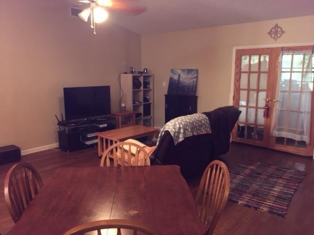 22477 Vistawood Way Boca Raton, FL 33428 - Photo 7 of 12 a living room with furniture a dining table and a piano