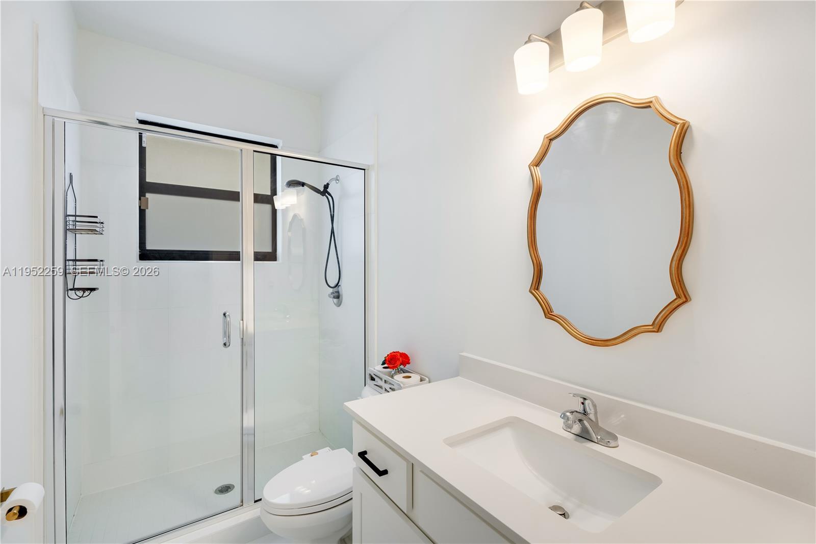 19410 Southwest 124th Court Miami, FL 33177 - Photo 13 of 33 a bathroom with a sink toilet and shower