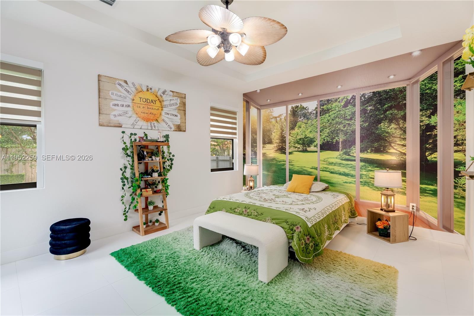 19410 Southwest 124th Court Miami, FL 33177 - Photo 16 of 33 a bedroom with a bed and a chandelier