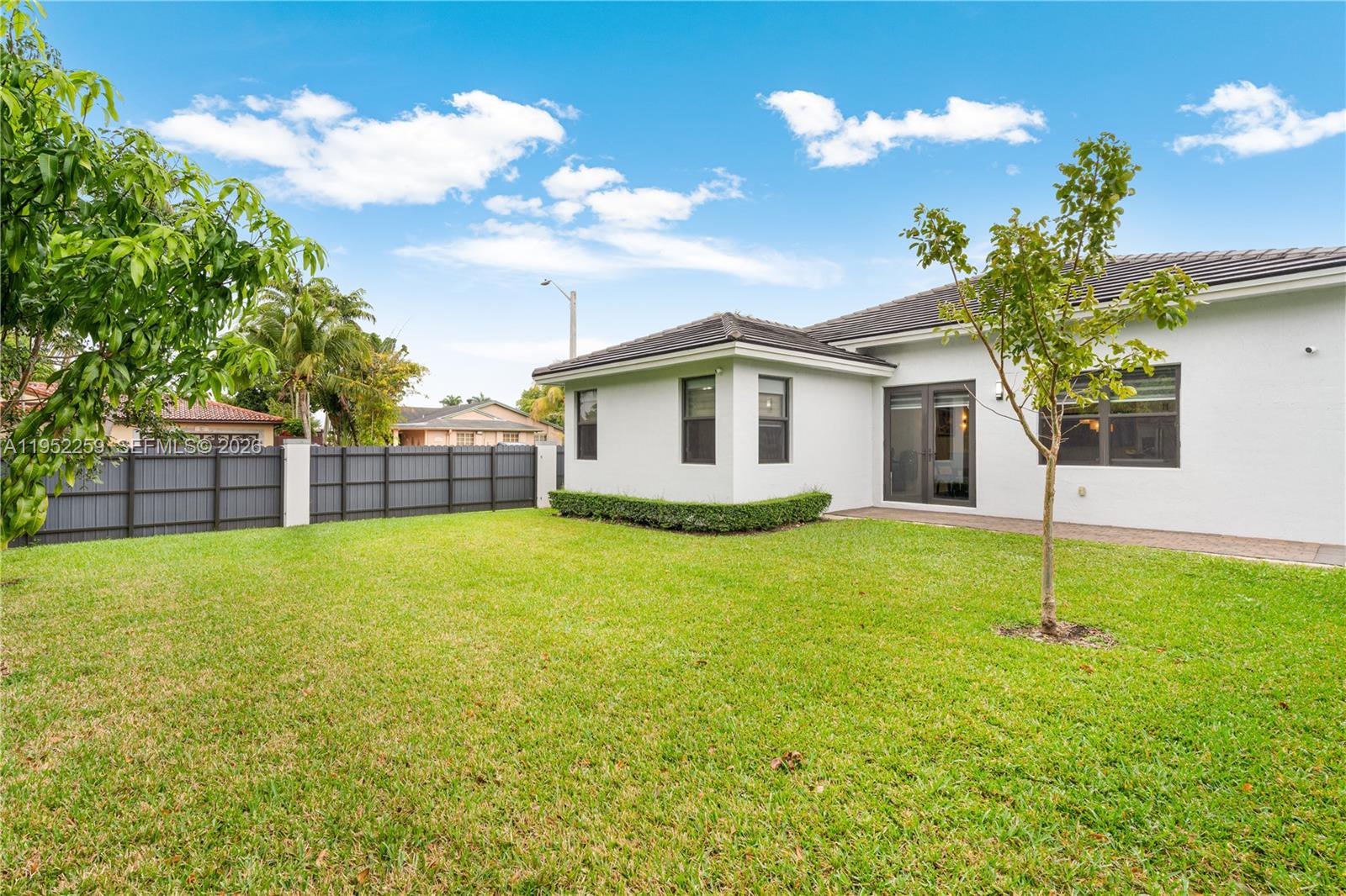 19410 Southwest 124th Court Miami, FL 33177 - Photo 25 of 33 a view of a house with backyard and garden