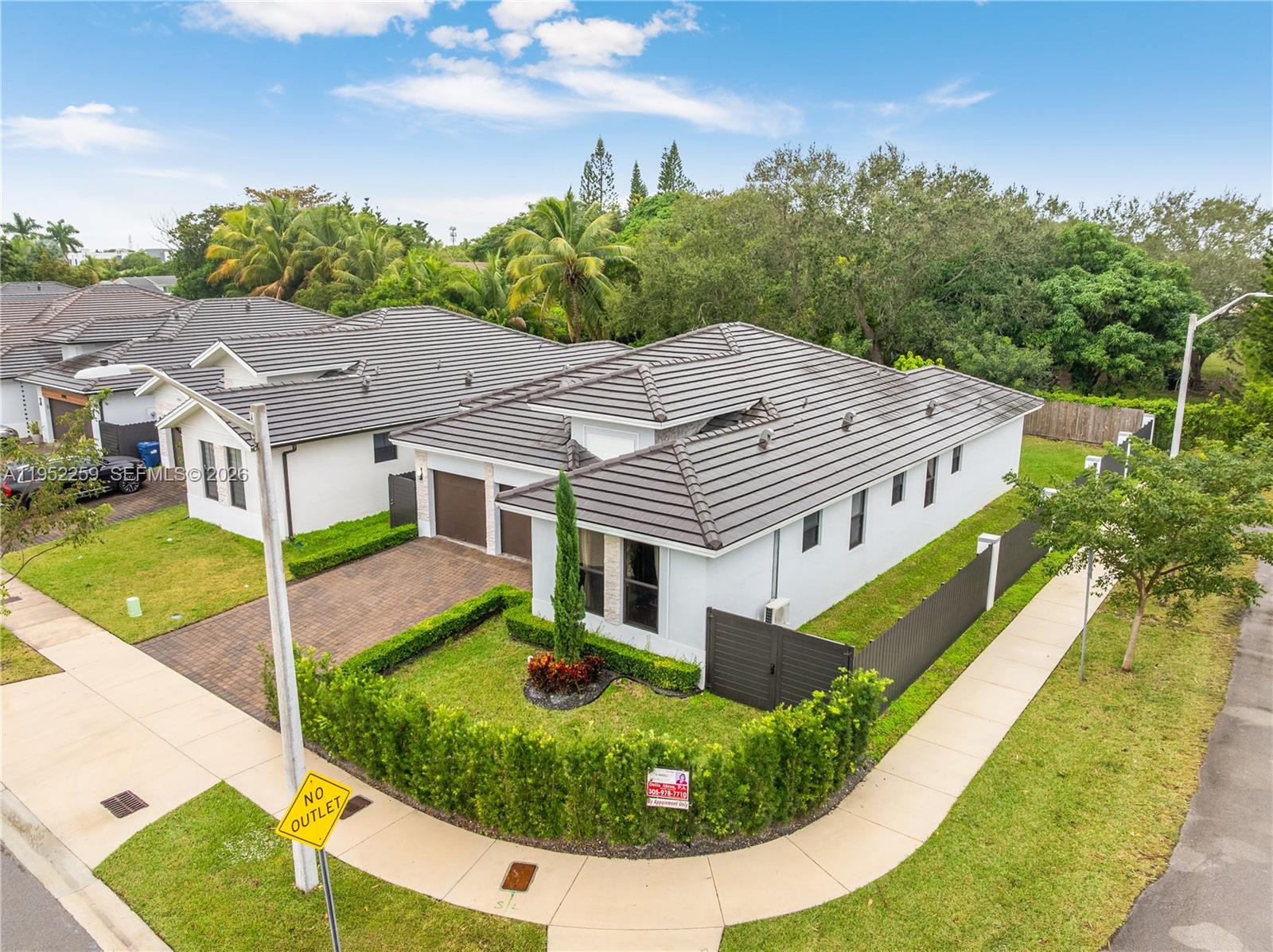 19410 Southwest 124th Court Miami, FL 33177 - Photo 29 of 33 a aerial view of a house with a yard