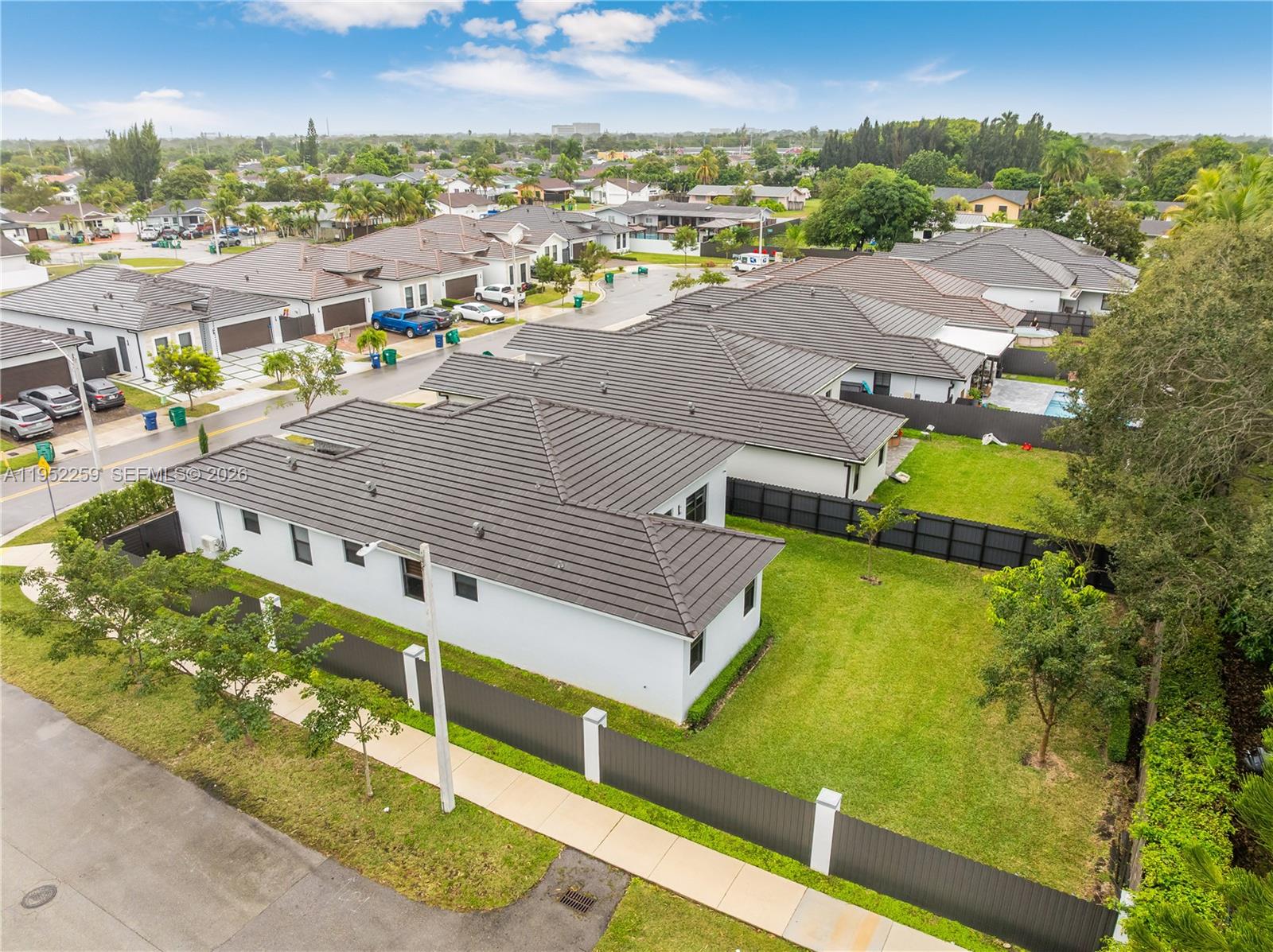19410 Southwest 124th Court Miami, FL 33177 - Photo 30 of 33 an aerial view of residential houses with outdoor space and street view