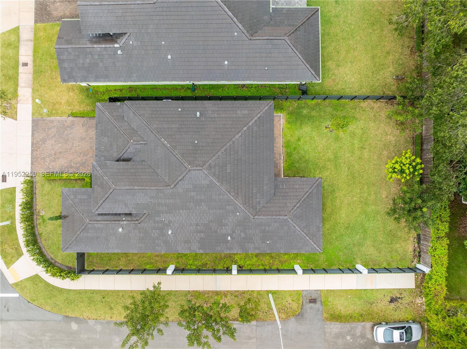 19410 Southwest 124th Court Miami, FL 33177 - Photo 31 of 33 an aerial view of a house with a yard