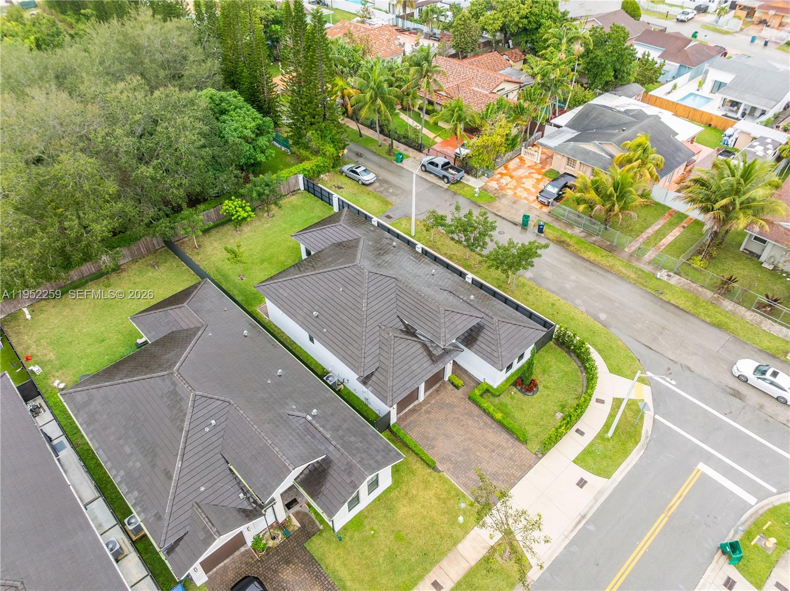 19410 Southwest 124th Court Miami, FL 33177 - Photo 32 of 33 an aerial view of a house with a swimming pool
