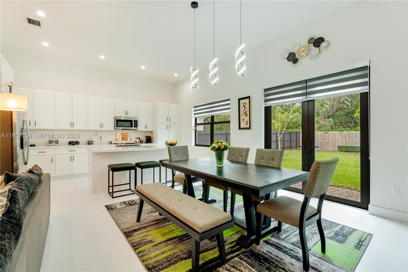 19410 Southwest 124th Court Miami, FL 33177 - Photo 7 of 33 a view of a dining room with furniture window and wooden floor