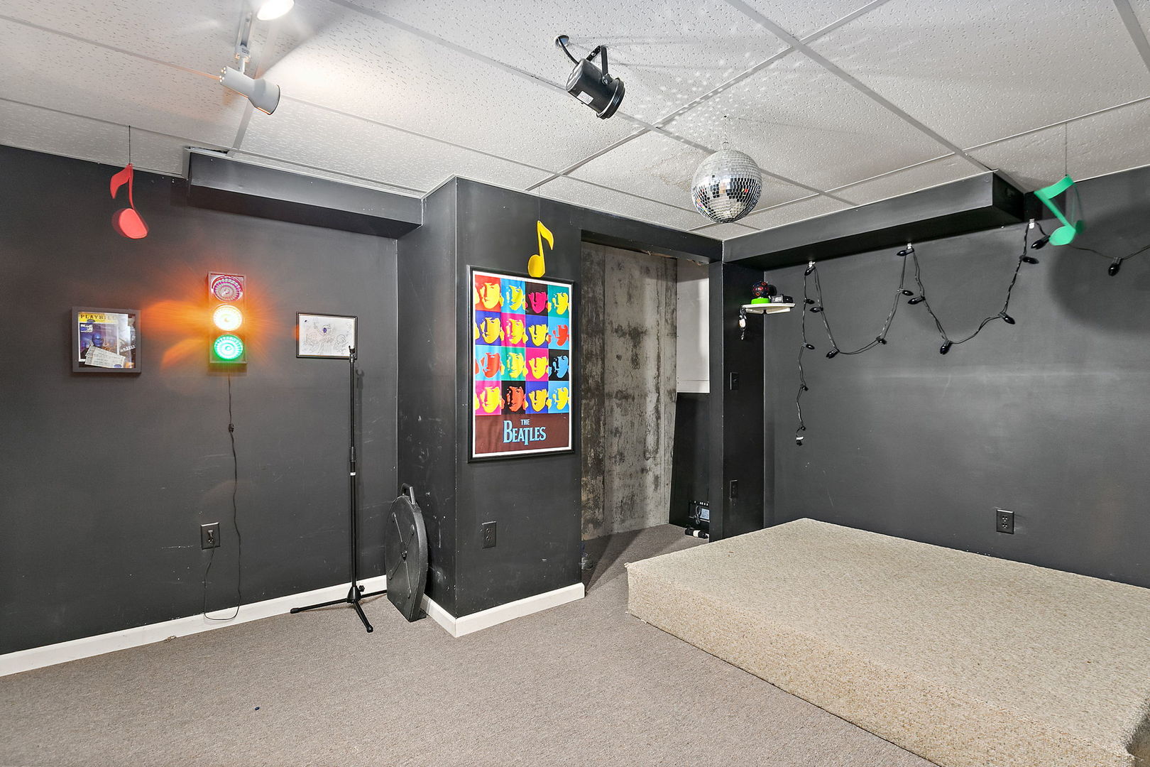 1205 South 1st Street DeKalb, IL 60115 - Photo 26 of 43 a bedroom with a bed and a flat screen tv