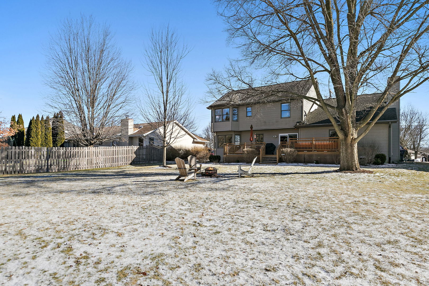 1205 South 1st Street DeKalb, IL 60115 - Photo 30 of 43 a view of a house with a snow on the road