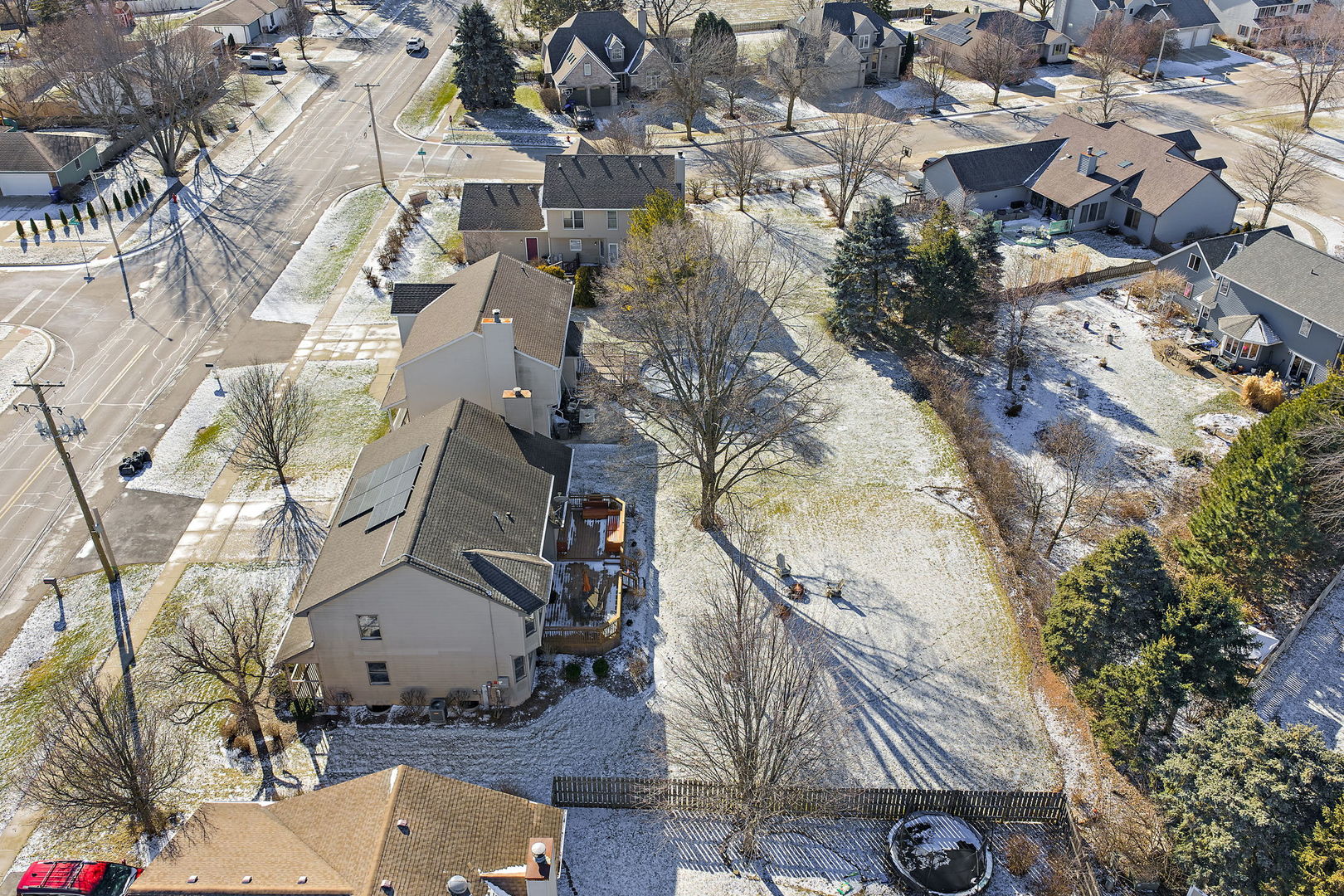 1205 South 1st Street DeKalb, IL 60115 - Photo 37 of 43 an aerial view of a house with a yard