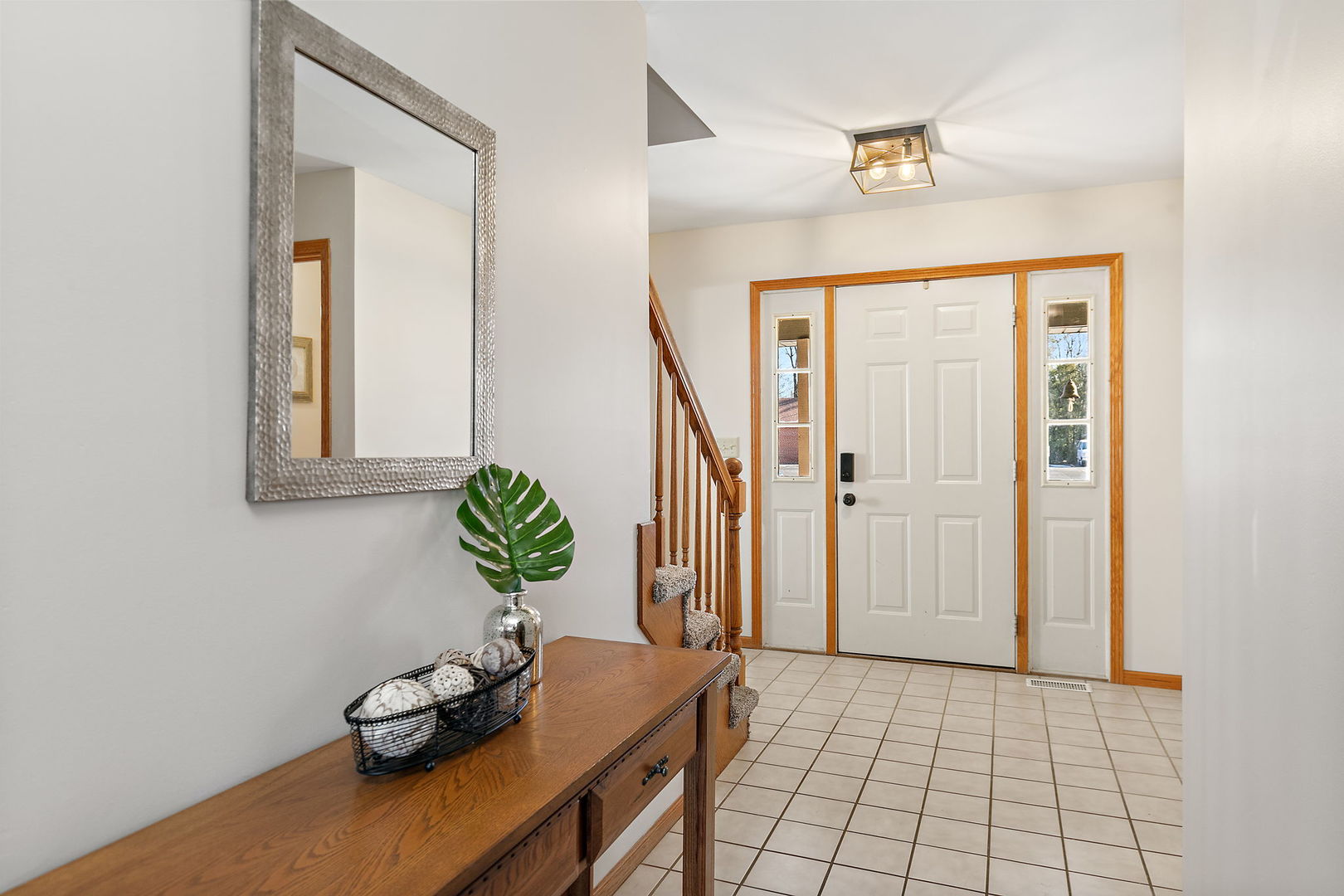 1205 South 1st Street DeKalb, IL 60115 - Photo 4 of 43 a view of a hallway to a livingroom with furniture