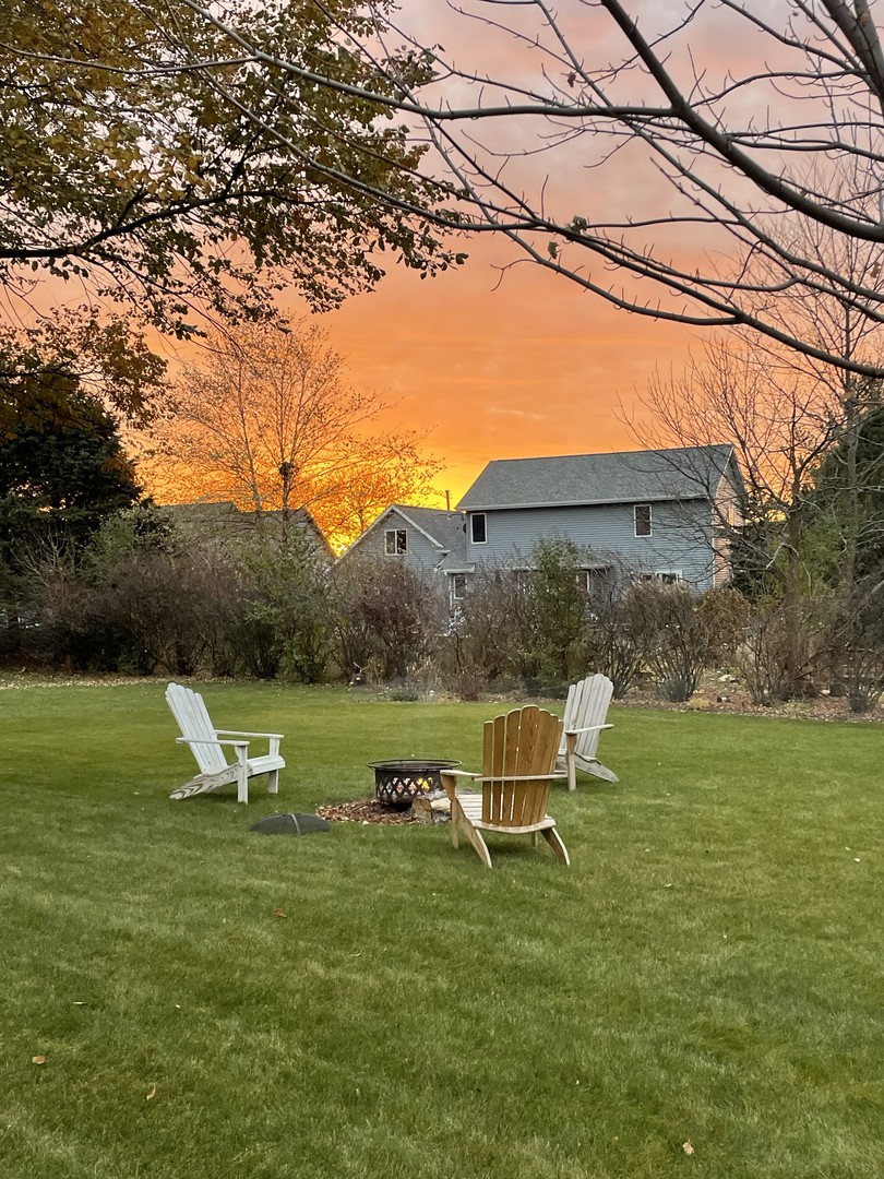 1205 South 1st Street DeKalb, IL 60115 - Photo 41 of 43 a view of a lake with a yard and potted plants