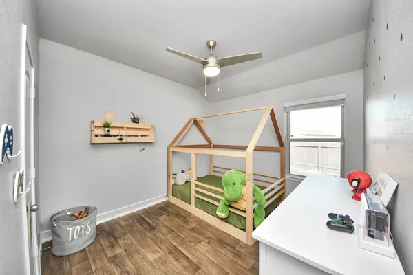 a kitchen with granite countertop a sink stainless steel appliances and cabinets