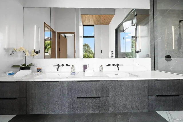 a living room with furniture wooden floor and a table
