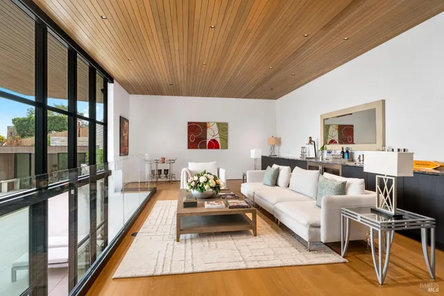 a view of balcony with two potted plants
