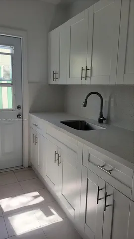 a view of cabinets with wooden cabinets
