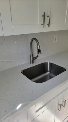 a close view of a sink and a tap