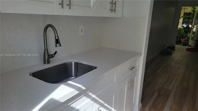 a view of a glass door and a porch