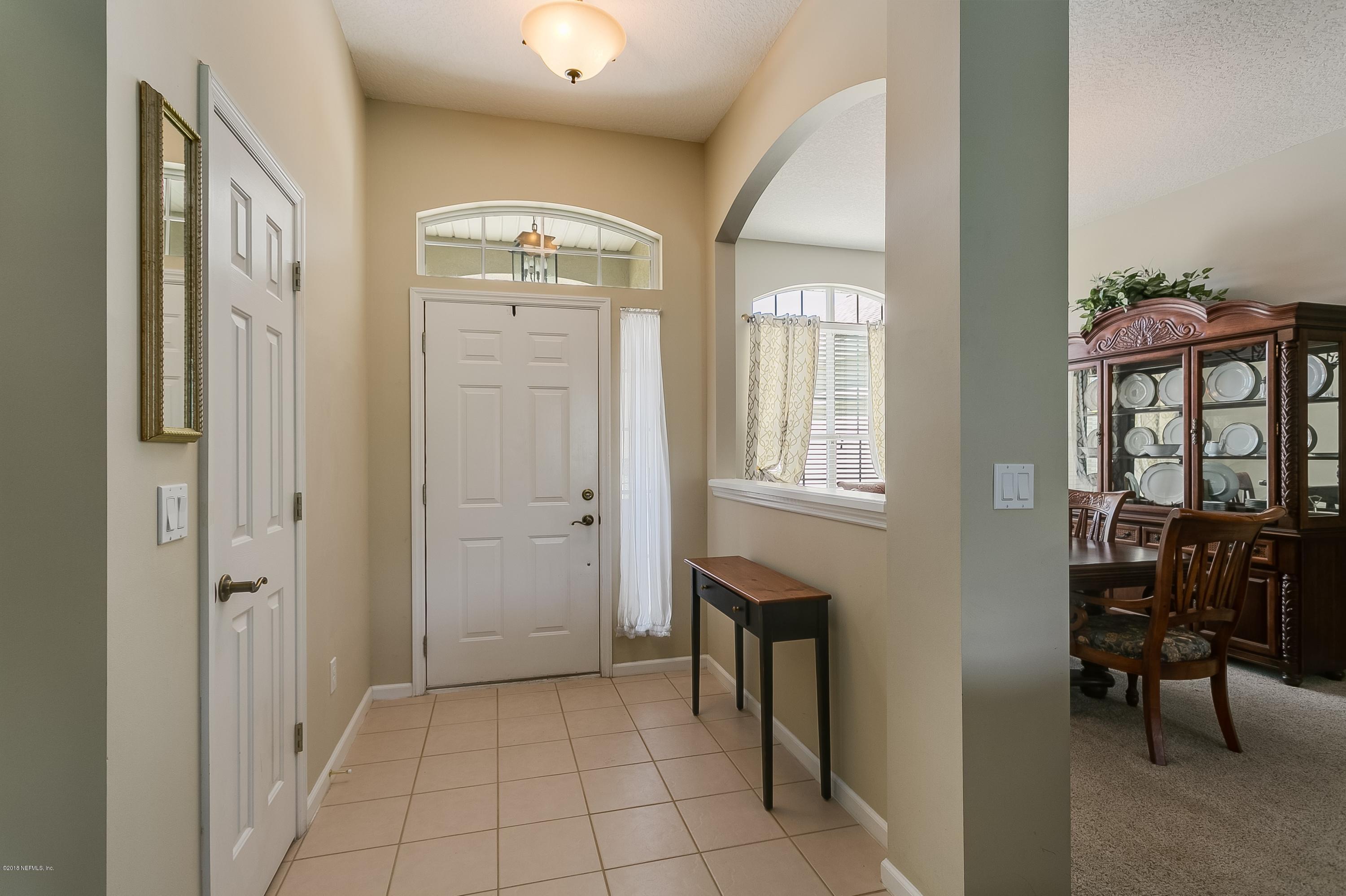 1164 Sandlake Road St. Augustine, FL 32092 - Photo 3 of 21 a view of a livingroom with furniture and windows