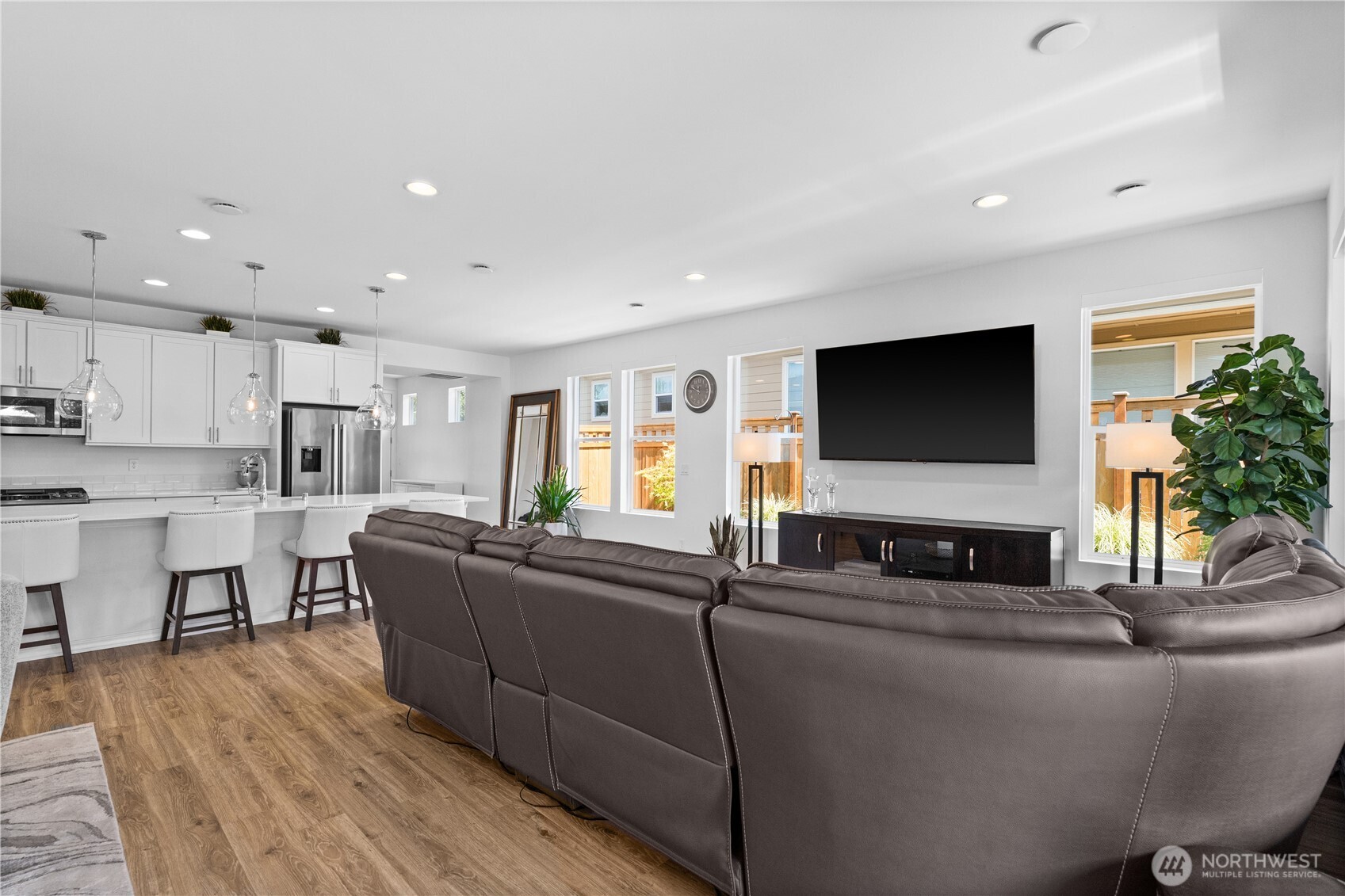 15215 182nd Avenue East Bonney Lake, WA 98391 - Photo 14 of 40 a living room with furniture and a flat screen tv