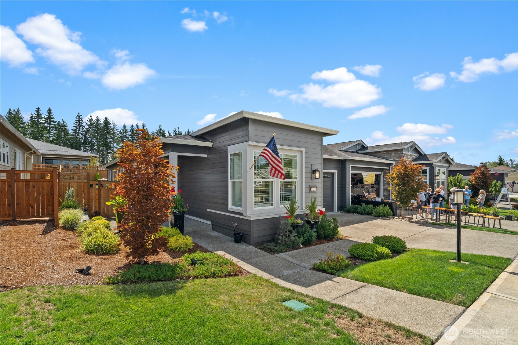 15215 182nd Avenue East Bonney Lake, WA 98391 - Photo 2 of 40 a front view of a house with a yard