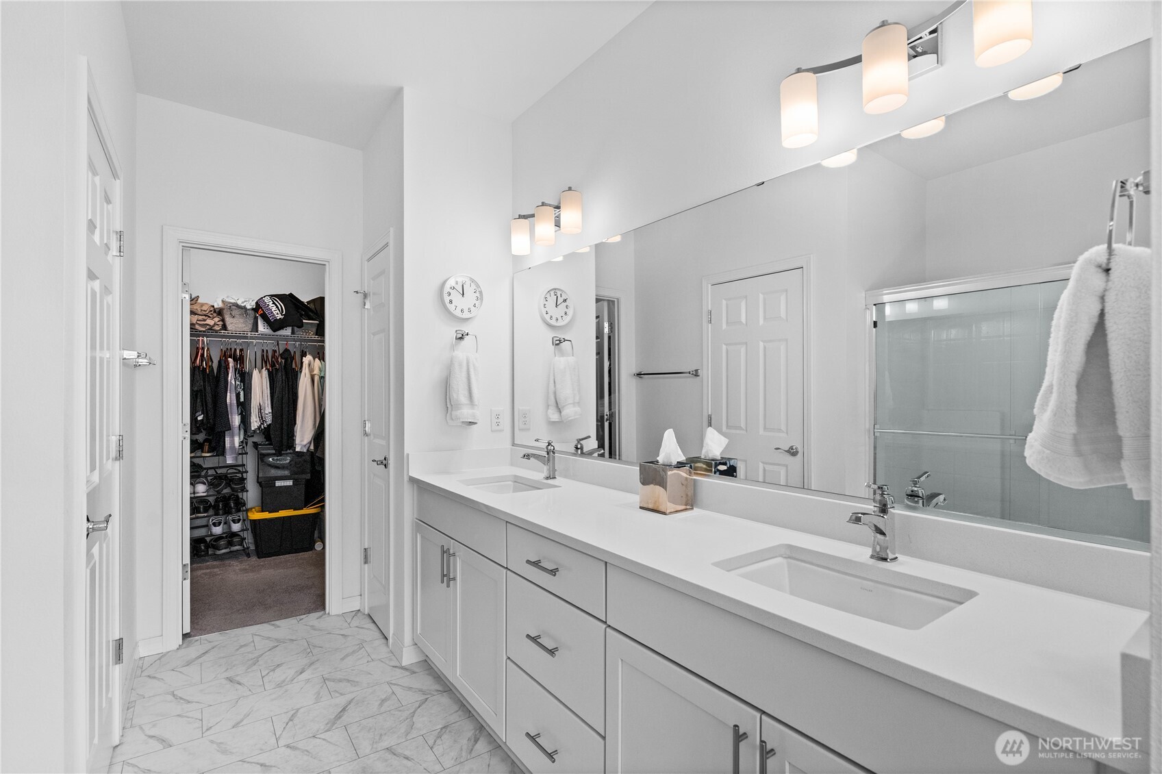 15215 182nd Avenue East Bonney Lake, WA 98391 - Photo 23 of 40 a bathroom with a sink vanity and a mirror