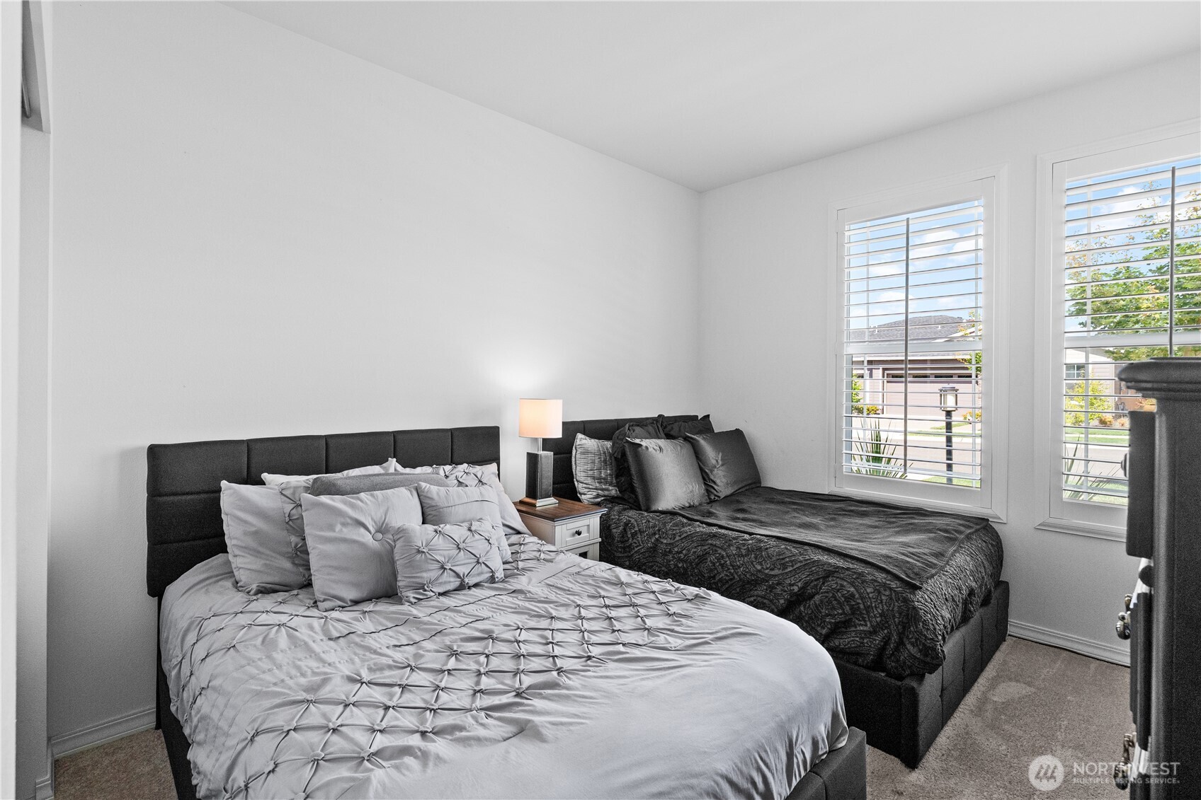 15215 182nd Avenue East Bonney Lake, WA 98391 - Photo 26 of 40 a bedroom with a bed and a large window
