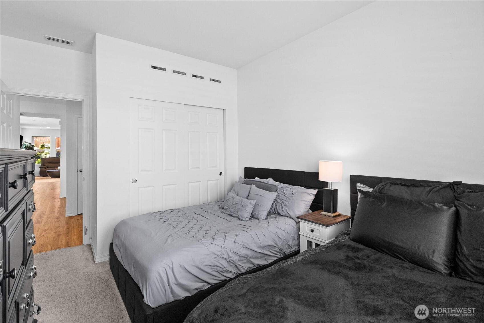 15215 182nd Avenue East Bonney Lake, WA 98391 - Photo 27 of 40 a bedroom with a bed and a television