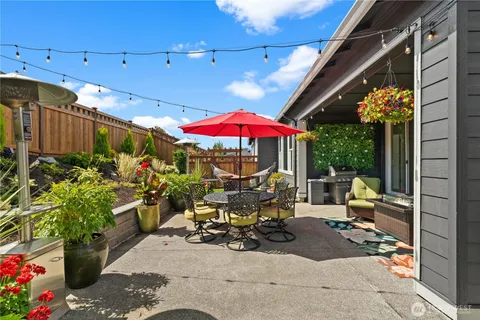a view of a chairs and tables in patio