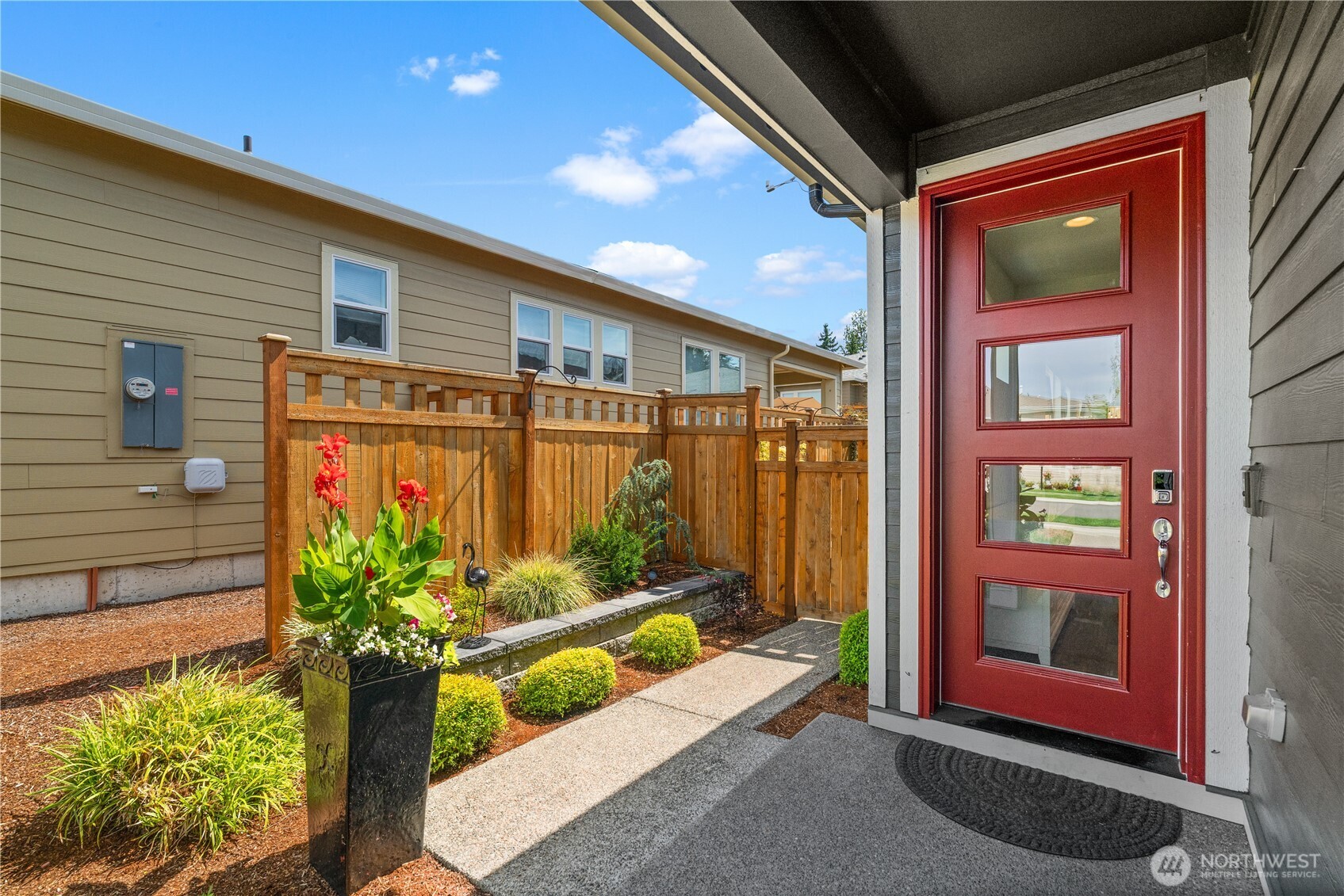 15215 182nd Avenue East Bonney Lake, WA 98391 - Photo 5 of 40 a front view of a house with a yard