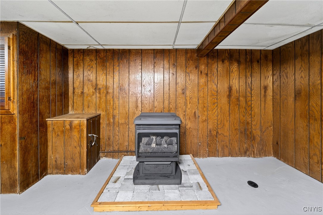 109 Leroy Road Cicero, NY 13212 - Photo 29 of 33 Gas fireplace in the basement conveys.