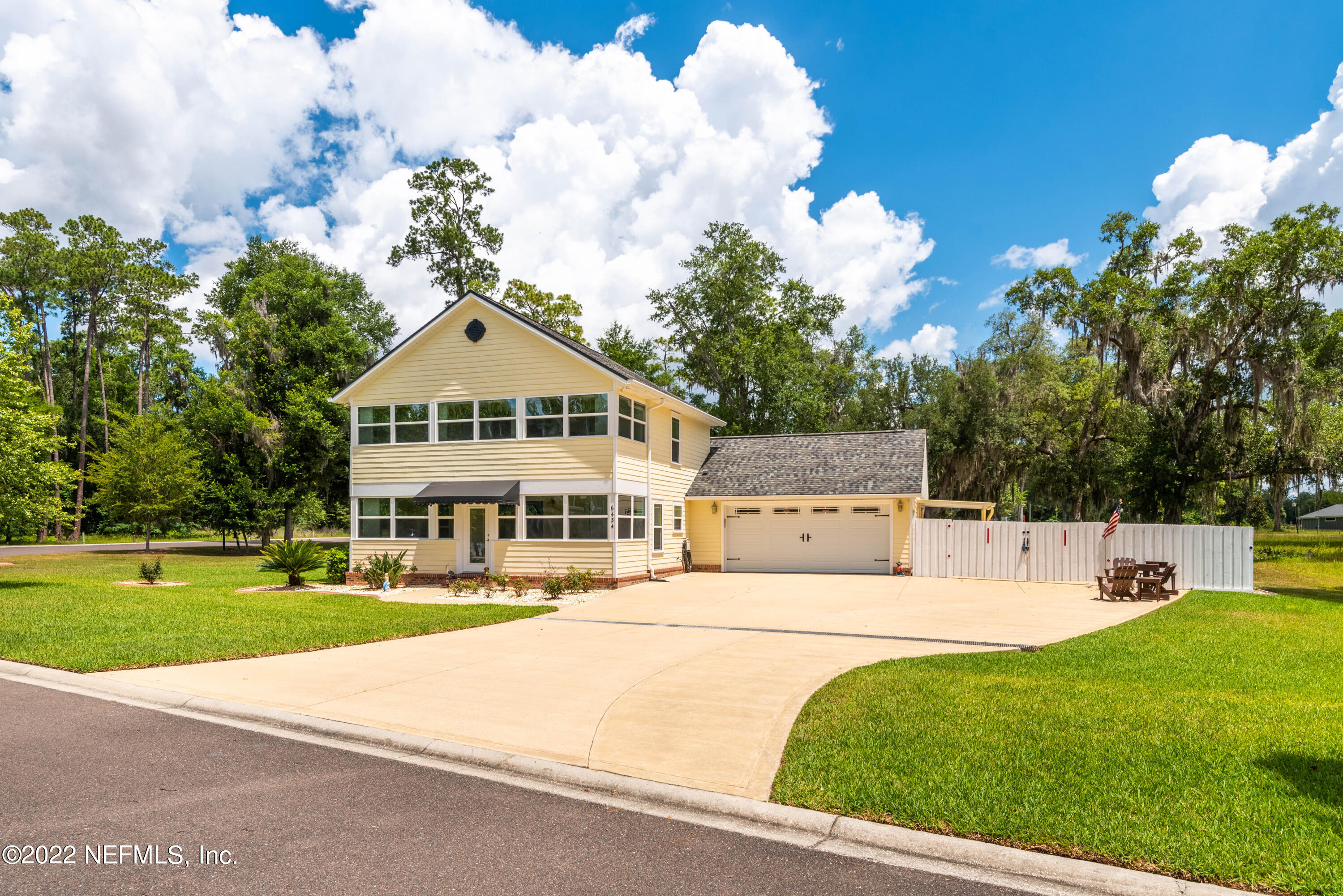 6434 Cabana Trace Starke, FL 32091 - Photo 2 of 38 a view of house with outdoor space and sitting area