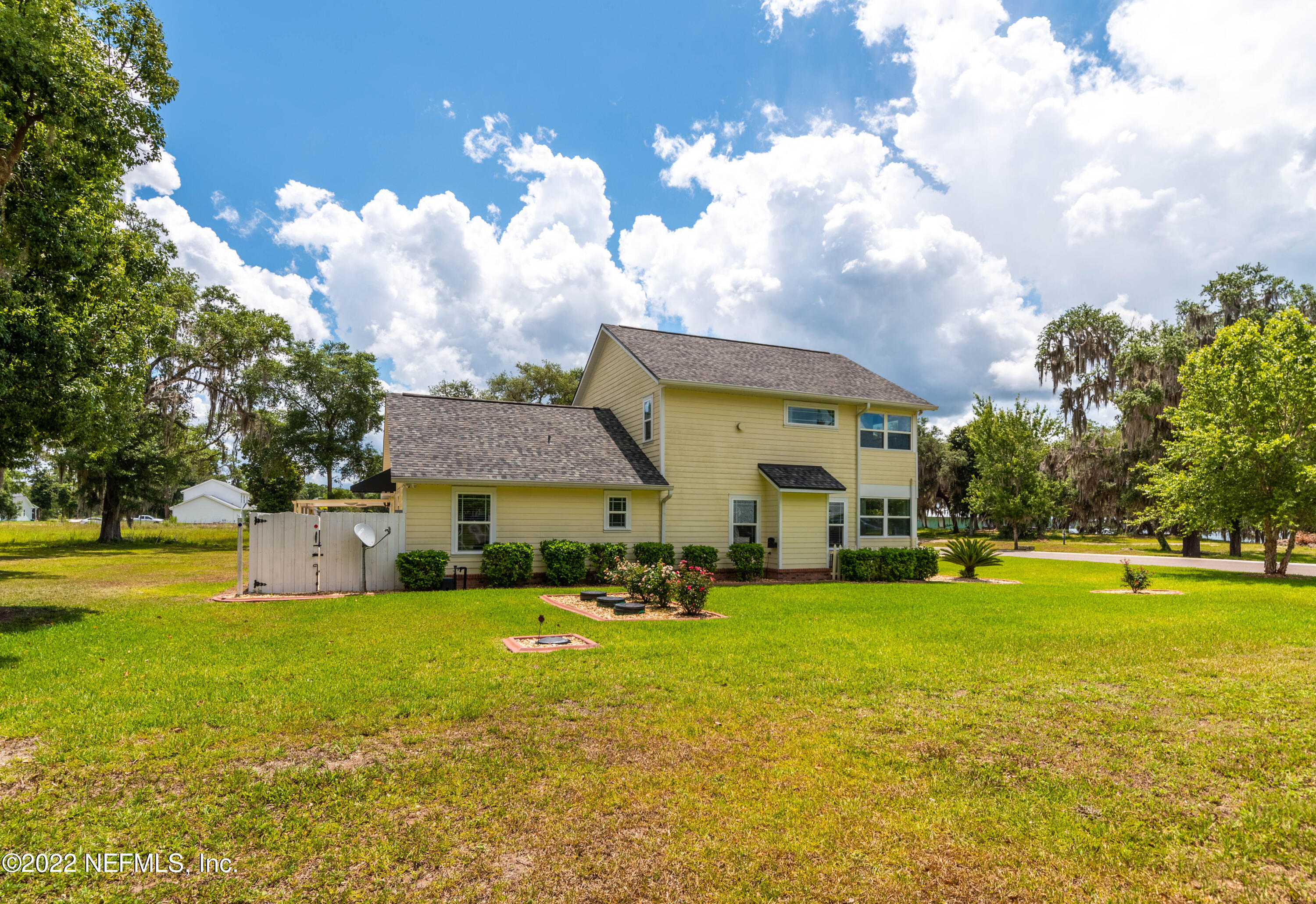 6434 Cabana Trace Starke, FL 32091 - Photo 30 of 38 a view of a house with a big yard