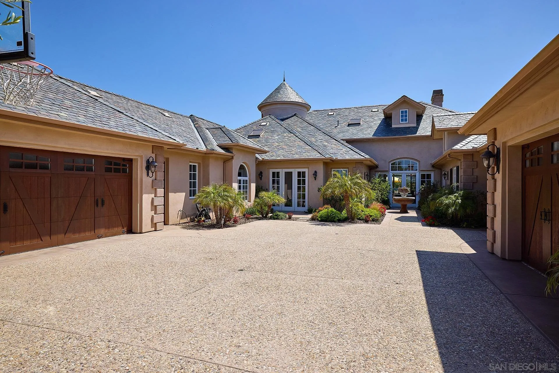 14460 Cheyenne Trail Poway, CA 92064 - Photo 14 of 74 a front view of a house with garden
