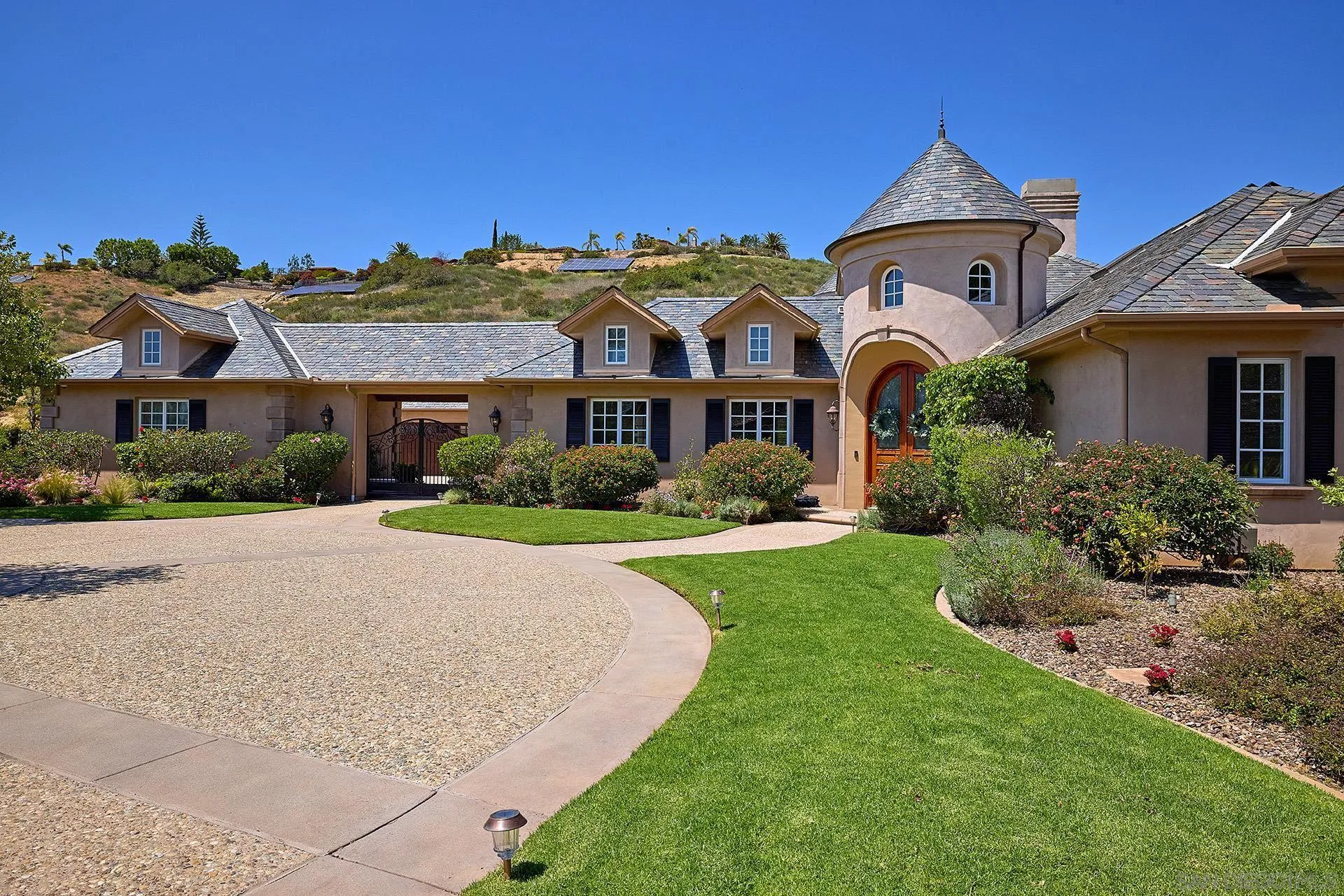 14460 Cheyenne Trail Poway, CA 92064 - Photo 15 of 74 a front view of a house with a yard